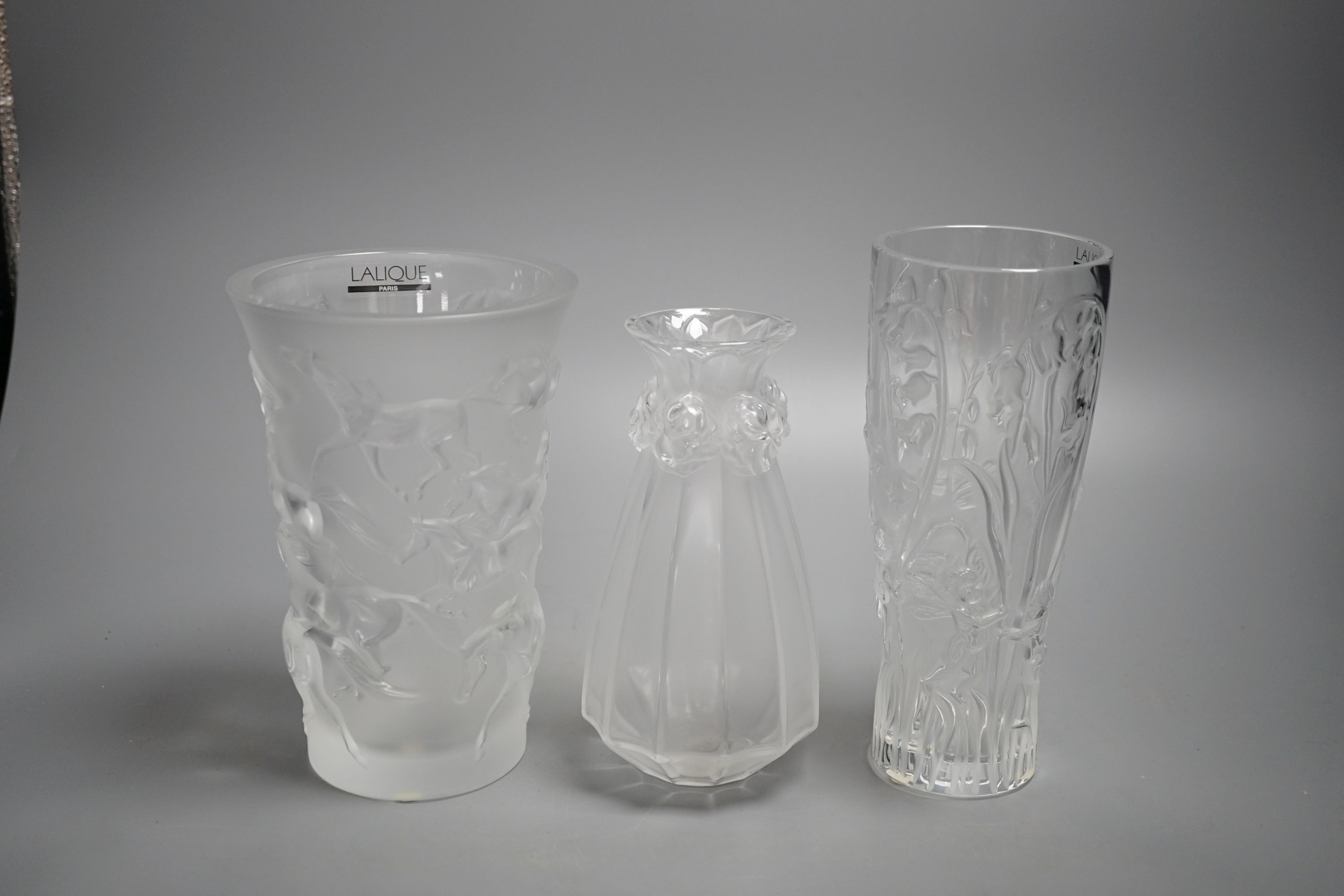 Three modern Lalique frosted glass vases - Oeillets (Carnations), Mustang and Elves pattern, tallest 20cm